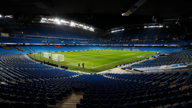 Etihad Stadium pitch and stands in Manchester, home of Manchester City