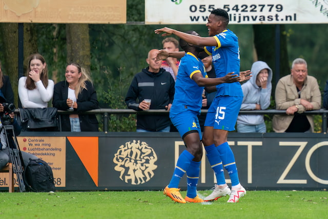 Mamelodi Sundowns players celebrating in blue and yellow kits during a friendly against Go Ahead Eagles.
